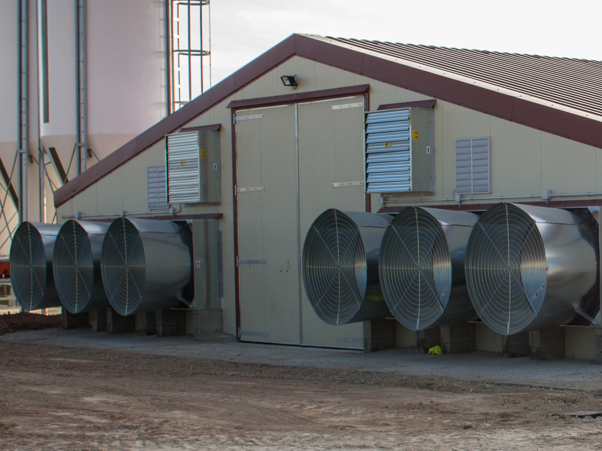 A row of Exafan EX series cone fans on a building wall